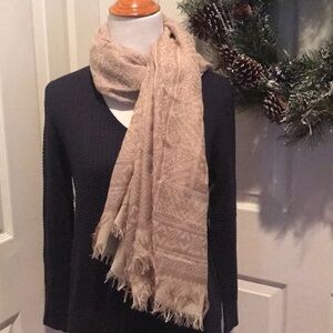 It's a scarf, a wrap, a great piece to own!